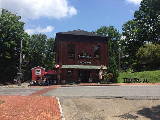 Food truck is the red trailer to the left of the TN Hills.