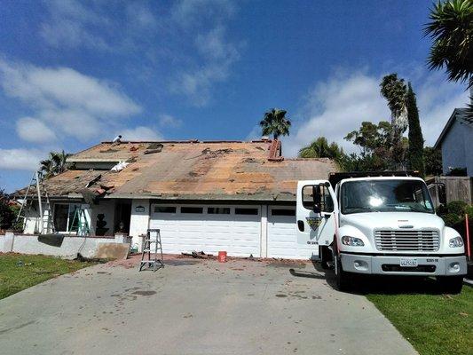 Replacing old roofing Tile 
With new roof shingles