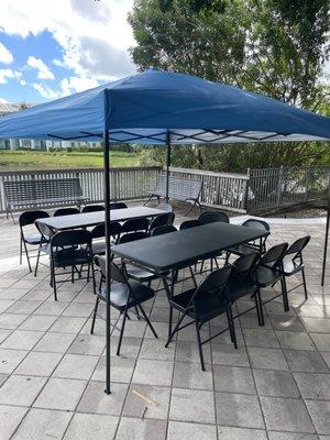 Tables and chairs and a tent