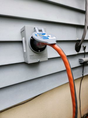 outside - 30 amp generator outlet for easy connection during power outages