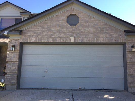 Before picture of an old garage door