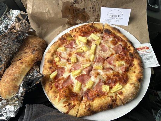 Hawaiian pizza with a Stromboli, cooked to perfection!