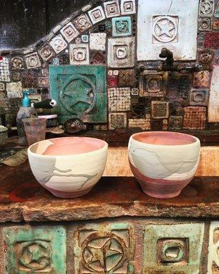 Glazing bowls in Kiln Yard