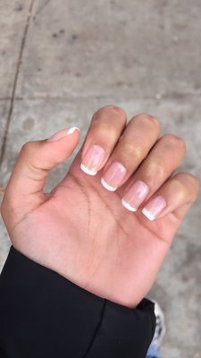 My gel French mani. She used an OPI white for the strip and a silver below. They always take their lovely time!!