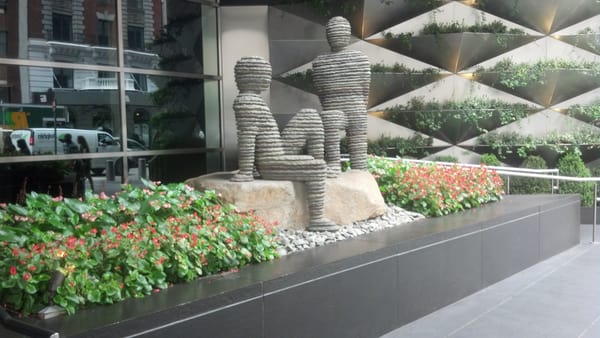 Annual flowers and English Ivy Topiary Wall at the Time Warner Center, NYC.