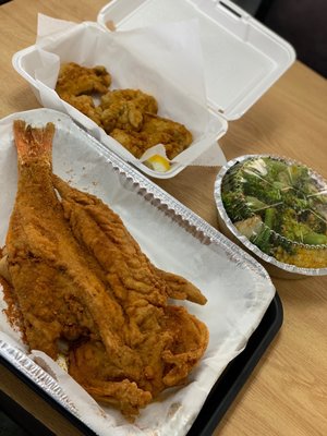 Fried fish , fried oysters and steamed vegetables