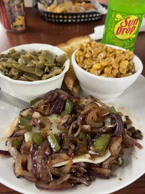 Hamburger steak with provolone, onions and peppers, skillet corn, green beans and a Sundrop