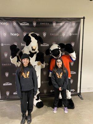 Sloan and Sutton with the cows.