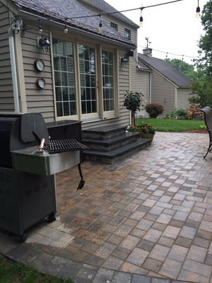 Nikolock pavers with steps made with blue granite tops