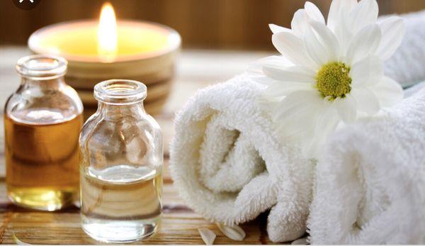 Essential oils, Towels, Flower and Candle