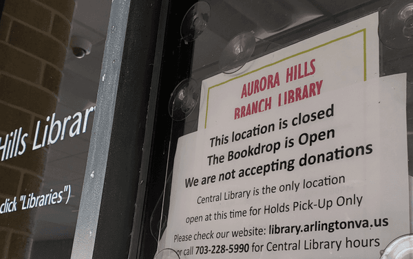 Close-up of the closed sign - This library branch closed in March 2020 and never reopened.