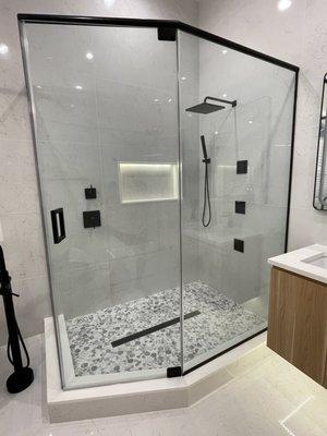 3 glass panels in matted black shower door