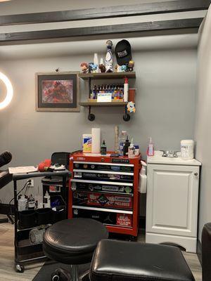 One of the tattoo artists station