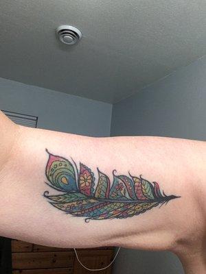 Feather tattoo by Anne