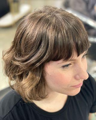 Hand-styled wavy french bob with blunt choppy fringe by Katy Brown Hairstylist in Boston.