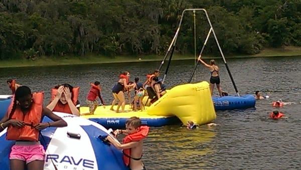 Campers love the floating water park at Camp Frontier