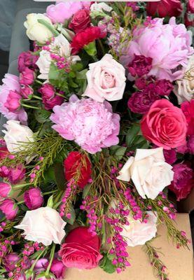 Close-up of flowers placed on ceremony arch!