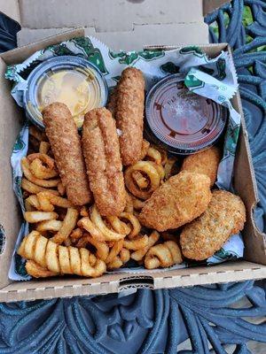 Mozzarella sticks, jalapeño poppers and curly fries