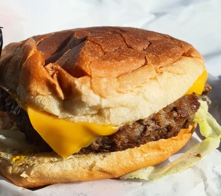 Old School Cheeseburger with lettuce, tomato, and onion, $3.75