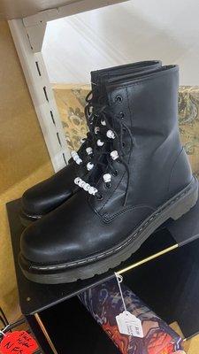 Combat boots with skull beads