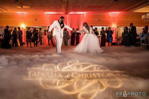 Wedding Couple Cloud Dancing with Uplighting and Monogram