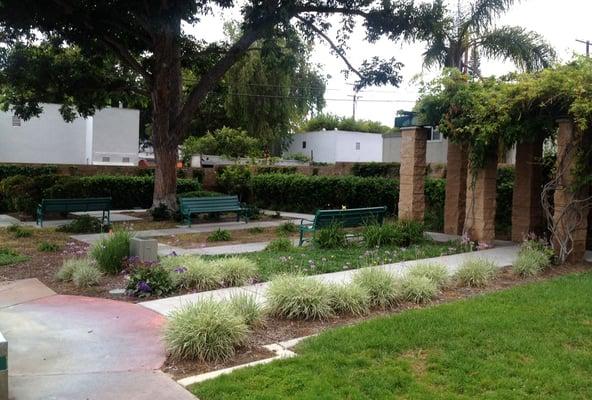 Nice seating area and walking path under a large tree