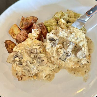 Pan seared chicken and mushrooms with an Irish whisky cream sauce served with beer braised cabbage and roasted red potatoes.