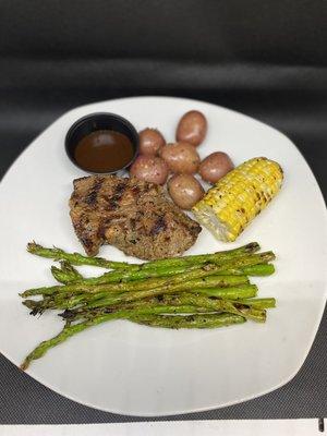 Private dinner: petite steak with asparagus/ grilled corn and baby potatoes