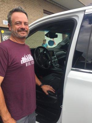 Mr. Horton picking up his newly virus free Suburban