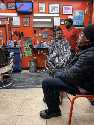 Barber cutting hair