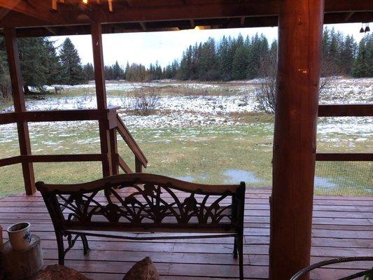 A view of the backyard and porch in the winter.  Just a shirt walk to the beach!