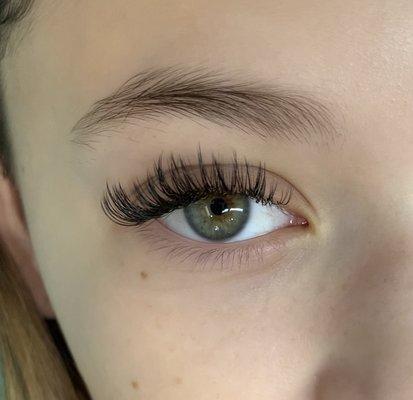 The "Wet Lash" look. Book a classic lash extension set.