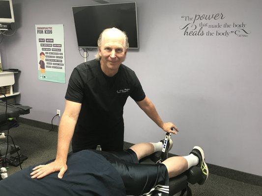 Dr. Adam Propper applying the Cox Technic for spinal decompression