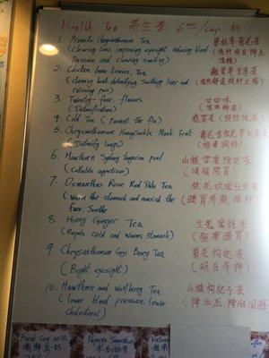 Health tea menu on right wall.