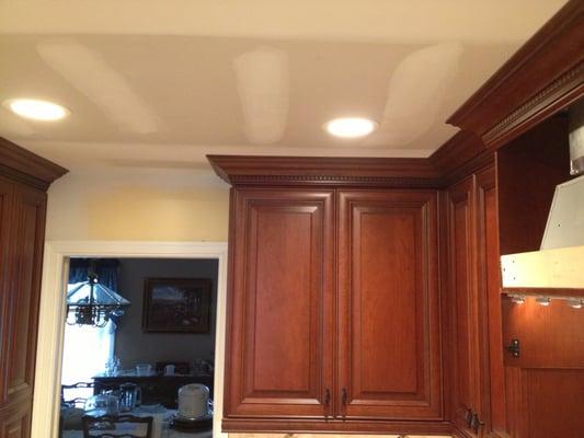 LED recessed light in kitchen ceiling. Finished product looks beautiful!