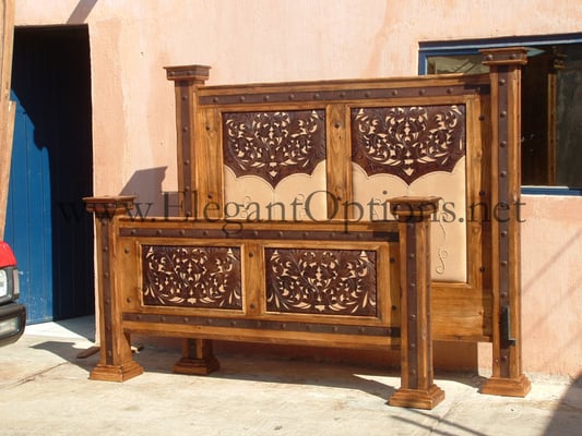 Hand tooled leather headboard and footboards. Rustic bedroom sets.