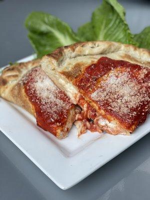 Calzone ricotta and Parmesan cheese marinara sauce