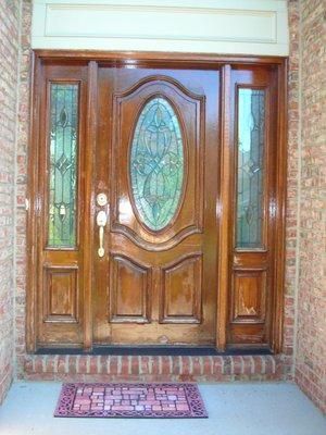 Single door with sidelights, before restoration process.