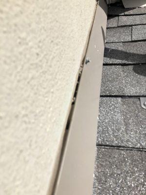 Example of gaps in caulking in the flashing. This was the same quality in all of the flashing and I fixed most of it myself rather than wait