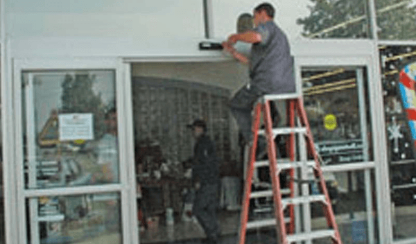 Technician working on doors