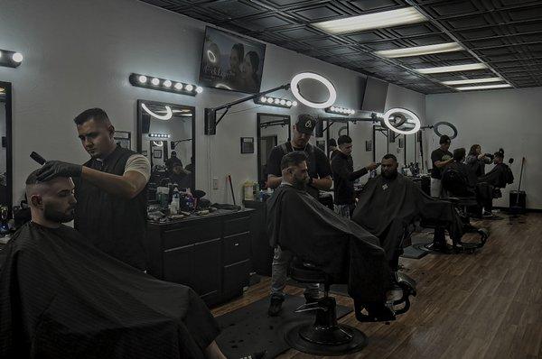 All the barbers saying focused to put out a quality haircut.