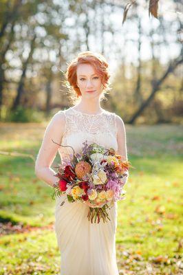 Loose bridal updo and natural airbrush makeup