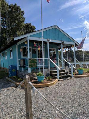 Buzzard's Point check-in window and store