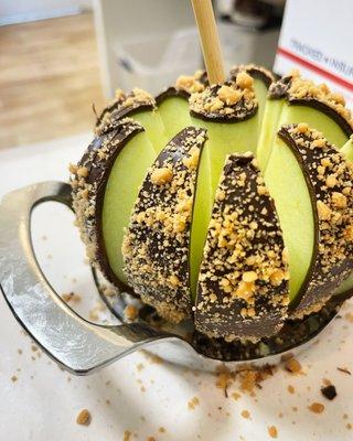 Caramel chocolate apples sliced on site!