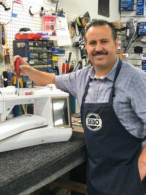 Store Owner and Lead Technician Pilar hard at work