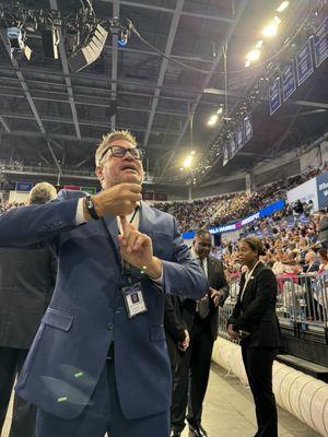 Aaron Shoemaker, dressed in a perfectly-fitting blue dress suit from Men's Wearhouse.