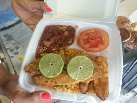 Fish Spanish rice bean plantain tomatoes