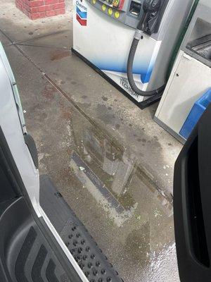 Puddle of diesel Gas on the floor from the pump leaking