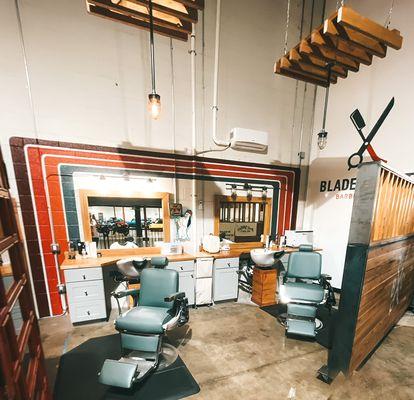 Blade Craft Barbershop boasts of a relaxing atmosphere inside of a luxury car storage facility.