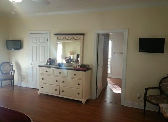 Spacious bedrooms with walk-in closets and adjoining bathrooms.